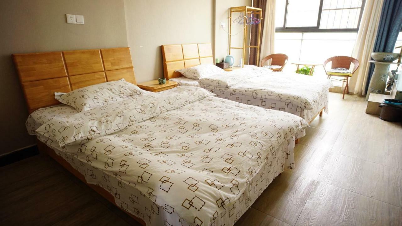 Huanlesong Youth Hostel Ухань Номер фото